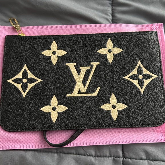 Louis Vuitton  black beige wristlet
No longer want it - Picture 2 of 3